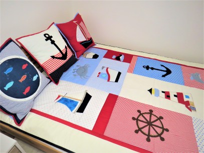 tengerészes,teknős,vasmacska,tengerészes,kék-piros-fehér,ágytakaró,párna